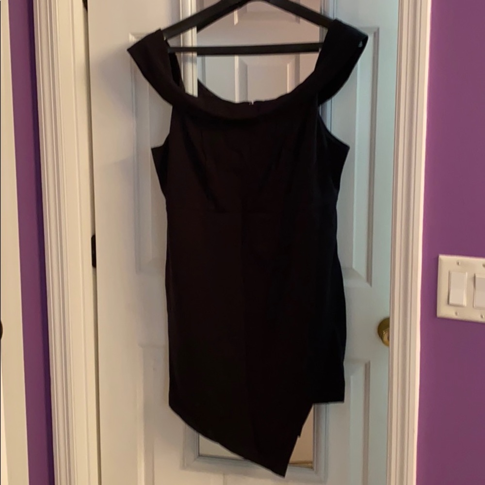 Black cocktail dress Asymmetrical hem.